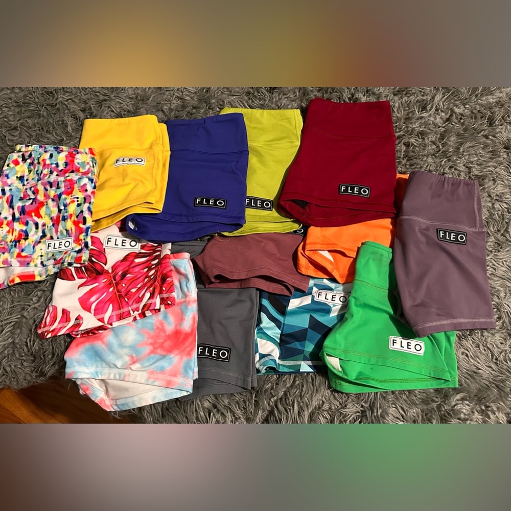 Lot of 13 pairs of fleo shorts- all size M